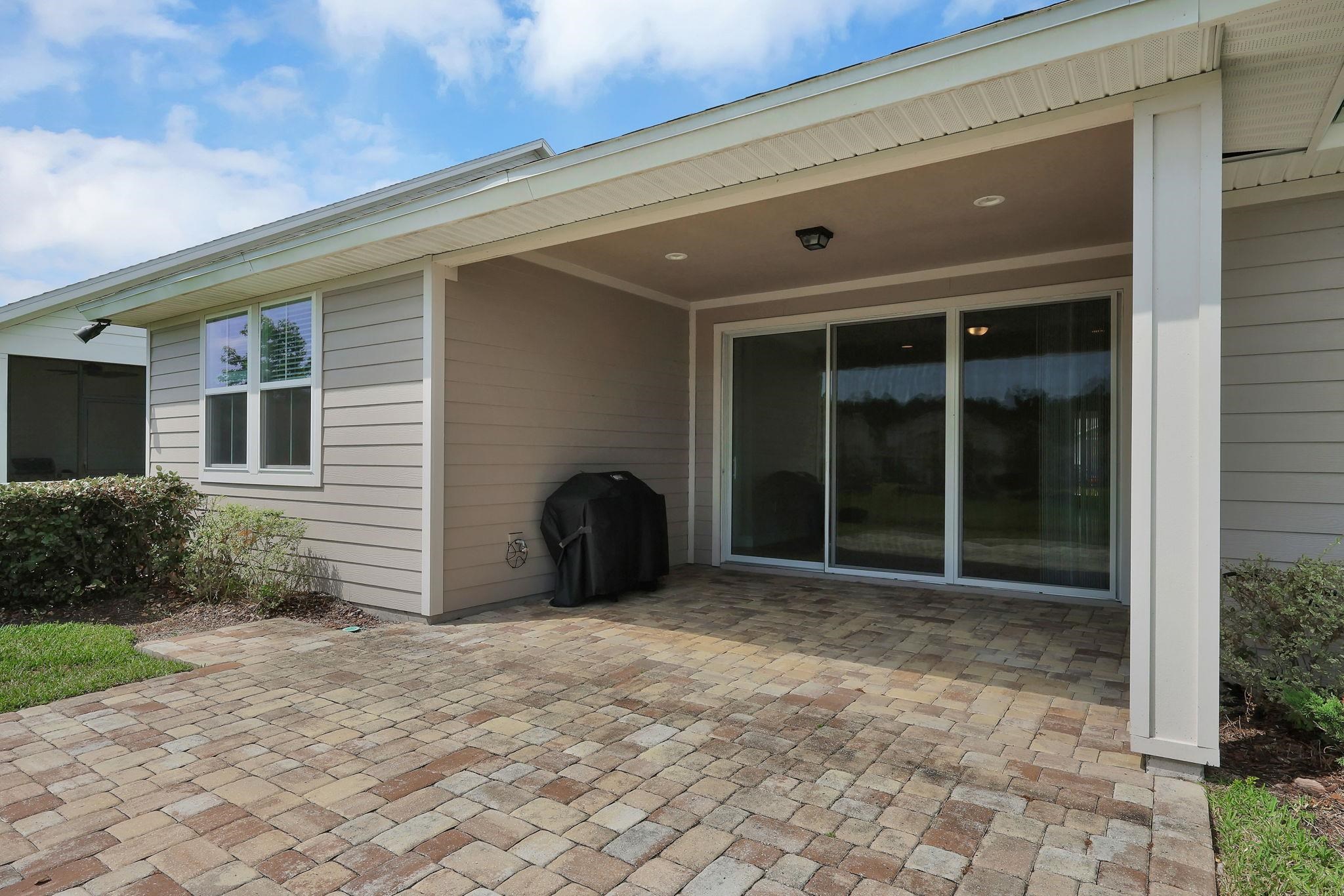164 Front Door Lane St. Augustine, FL 32095 - Photo 29 of 42 a view of a entrance door of the house
