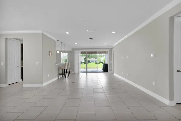 a view of a hallway with a bathroom