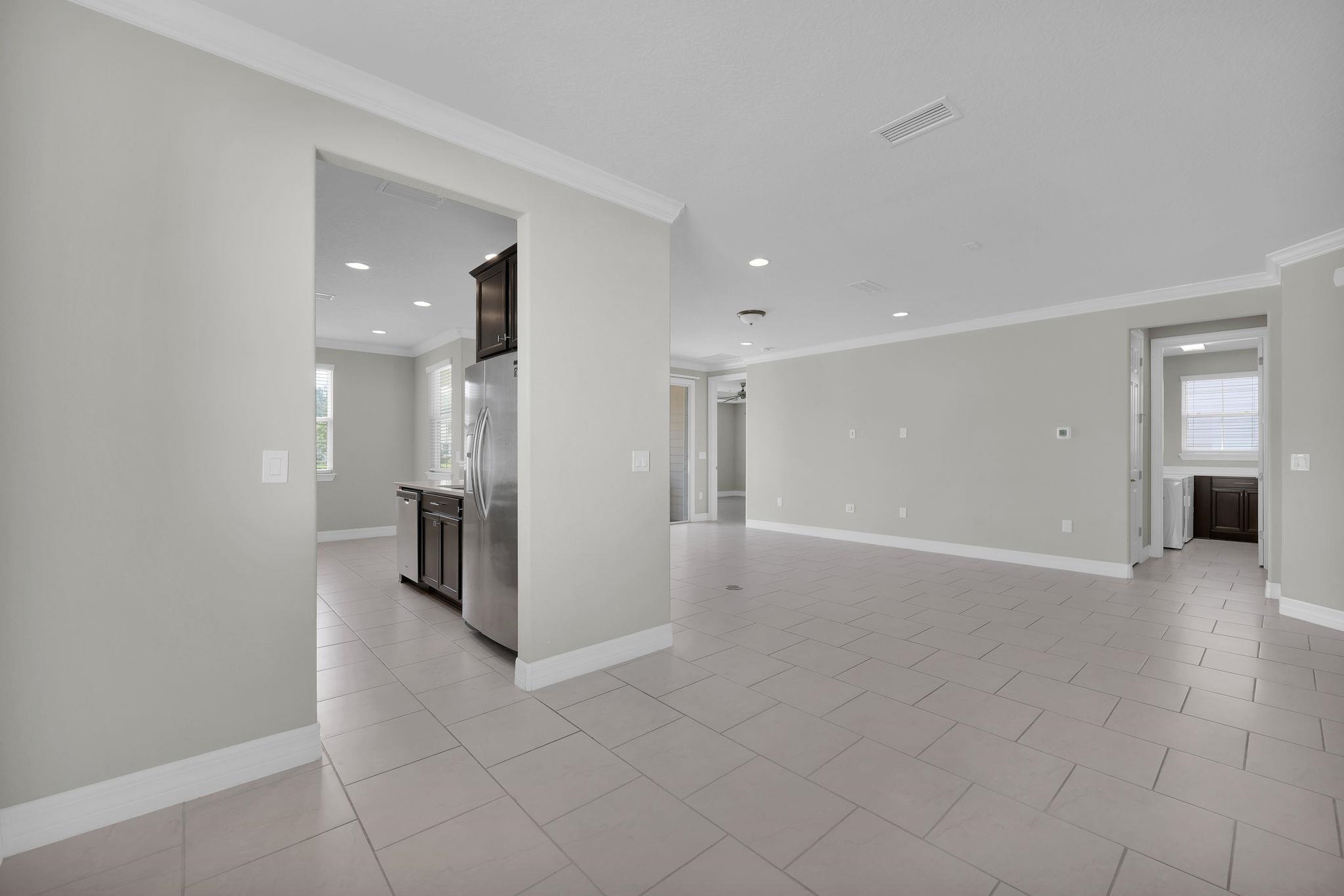 164 Front Door Lane St. Augustine, FL 32095 - Photo 9 of 42 a view of a hallway with a bathroom