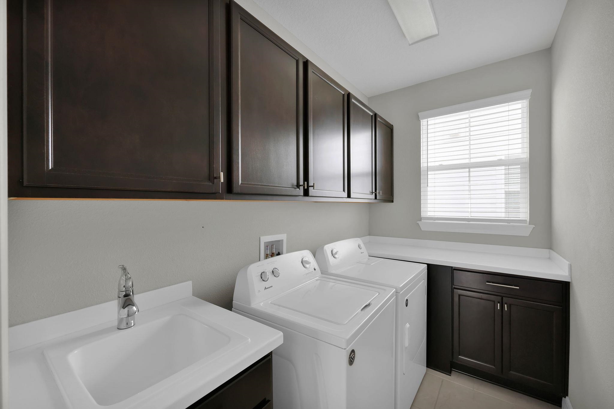 164 Front Door Lane St. Augustine, FL 32095 - Photo 10 of 42 a bathroom with a sink and a window