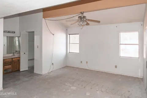 an empty room with windows