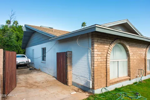 a view of a car door with wooden floor