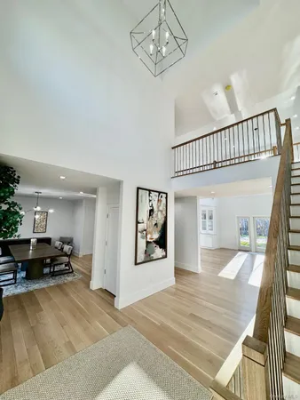 a bedroom with a bed and furniture