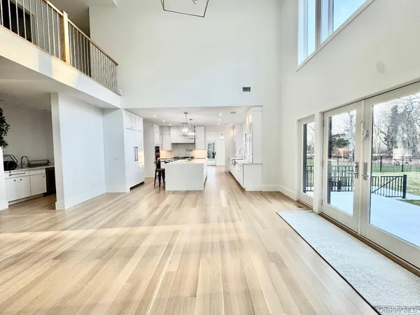 a view of entryway with wooden floor