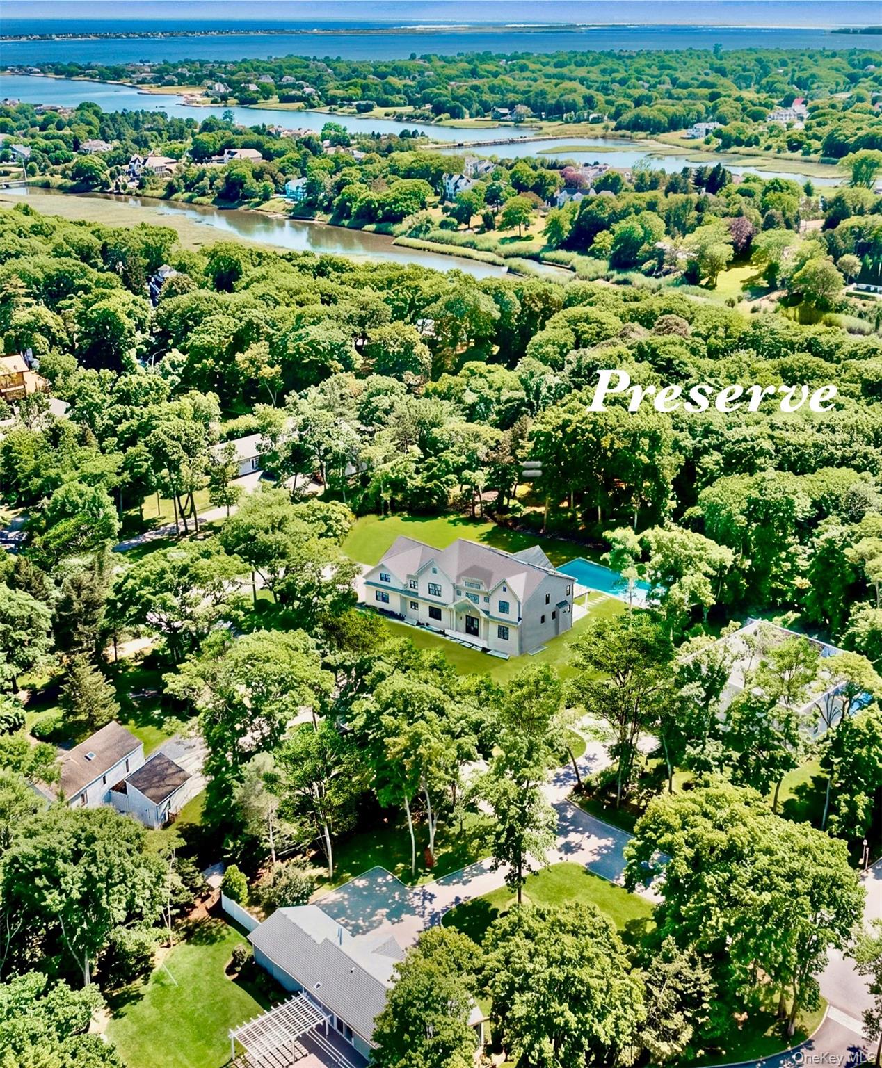 69 Jagger Lane Westhampton, NY 11977 - Photo 2 of 50 Expansive property featuring a large residence, nature lovers paradise, minutes to ocean beaches, with a full sized gunite heated saltwater pool.