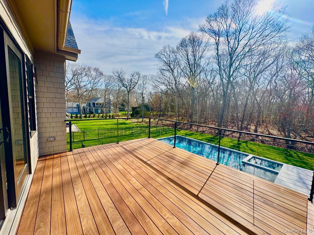 69 Jagger Lane Westhampton, NY 11977 - Photo 35 of 50 Ipe deck with stainless cable railings.