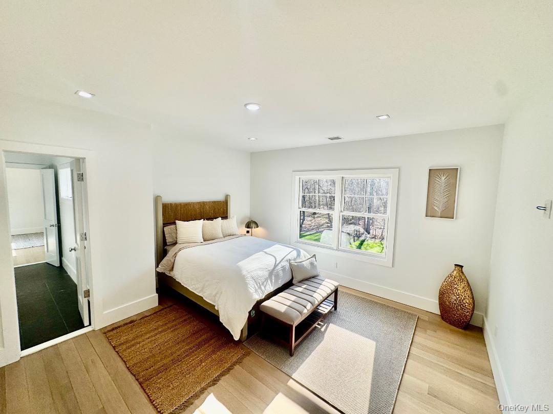 69 Jagger Lane Westhampton, NY 11977 - Photo 37 of 50 Upper Level Bedroom with Jack & Jill ensuite bath.