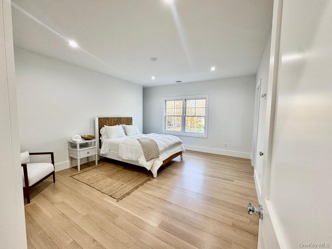 69 Jagger Lane Westhampton, NY 11977 - Photo 38 of 50 Upper Level front facing Ensuite Bedroom, Walk in closet.