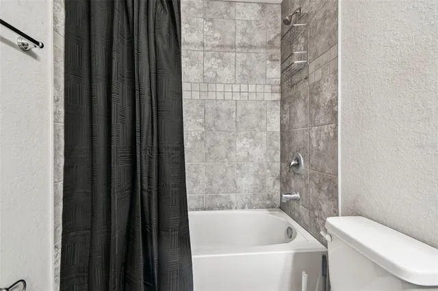 a building with trees in front of it