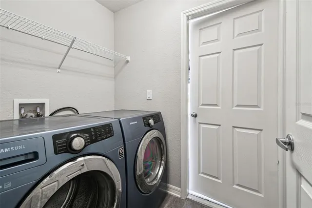 an aerial view of a house with outdoor space