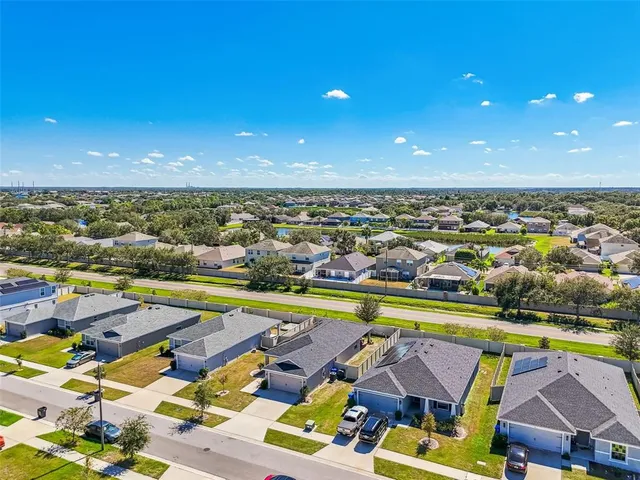 a view of an outdoor space and tennis court