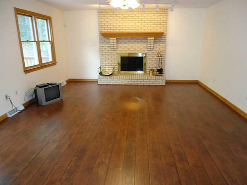 249 Silver Slipper Road Hookstown, PA 15050 - Photo 3 of 24 Family Room. Laminate Canyon Oak Flooring & enjoy the warmth of the gas fireplace.