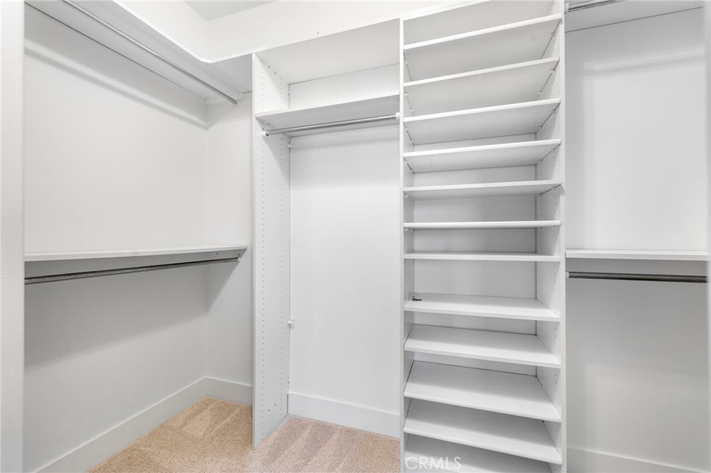19 Vinca Court Ladera Ranch, CA 92694 - Photo 16 of 29 a view of walk in closet with empty racks
