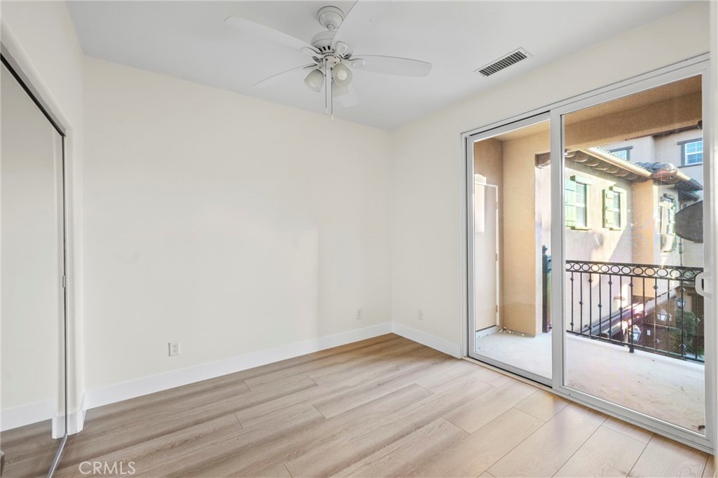 19 Vinca Court Ladera Ranch, CA 92694 - Photo 18 of 29 an empty room with wooden floor and windows