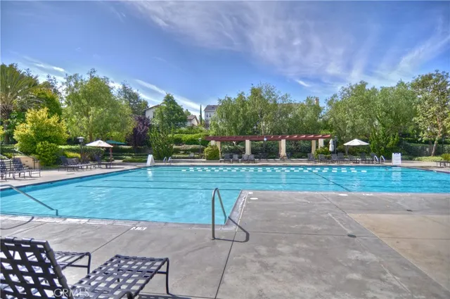 a view of a swimming pool with a patio
