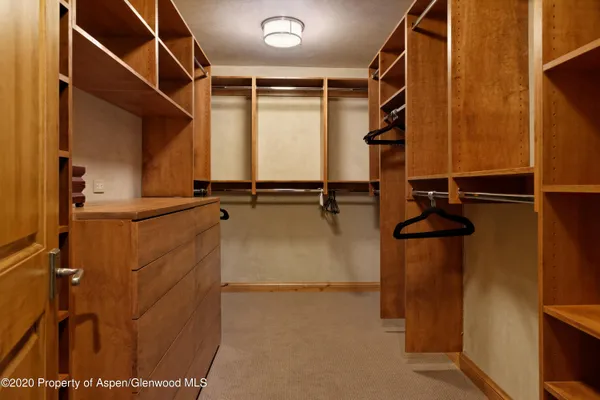 a view of a room with rack on the wall