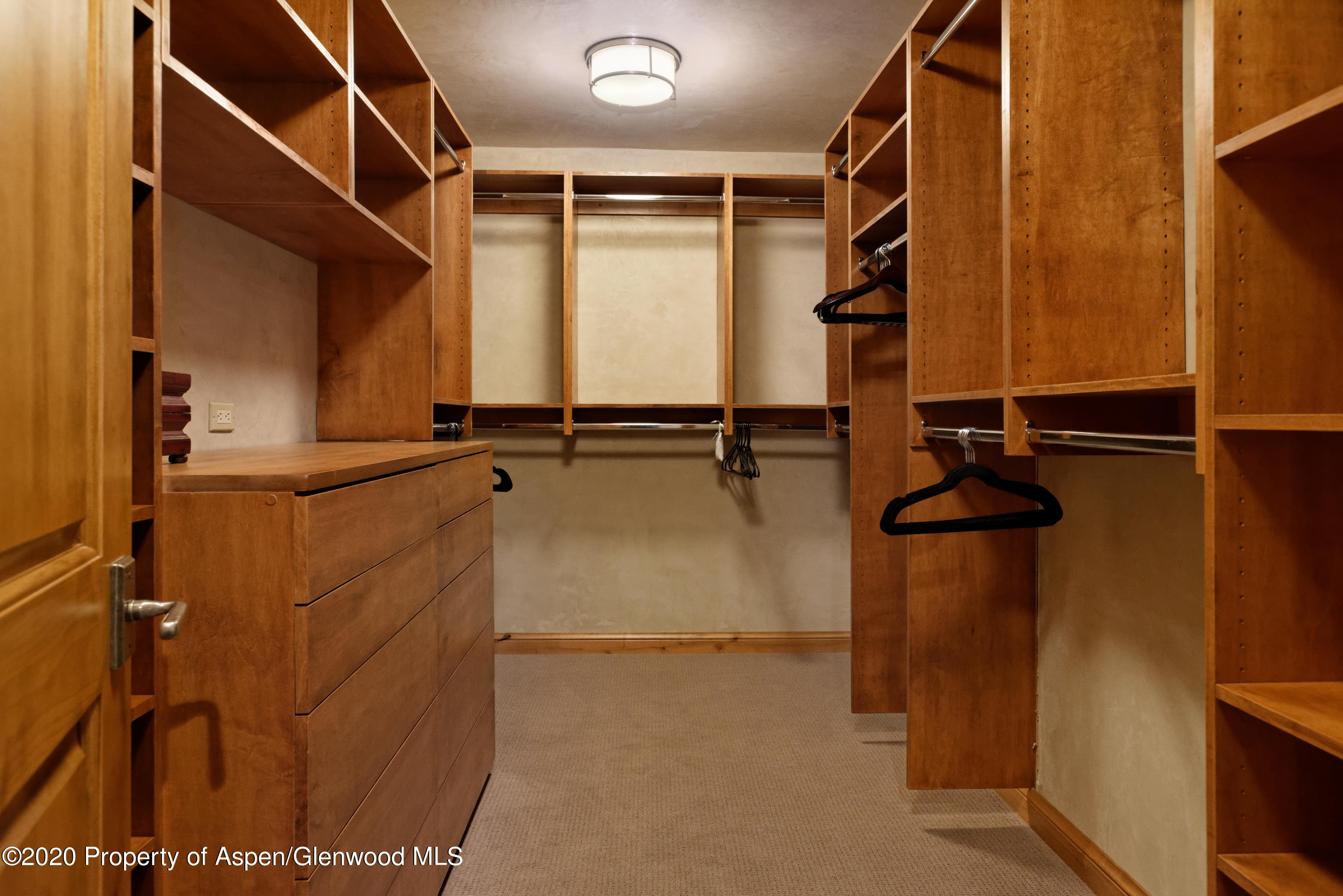 32 Prospector Road Aspen, CO 81611 - Photo 15 of 37 a view of a room with rack on the wall