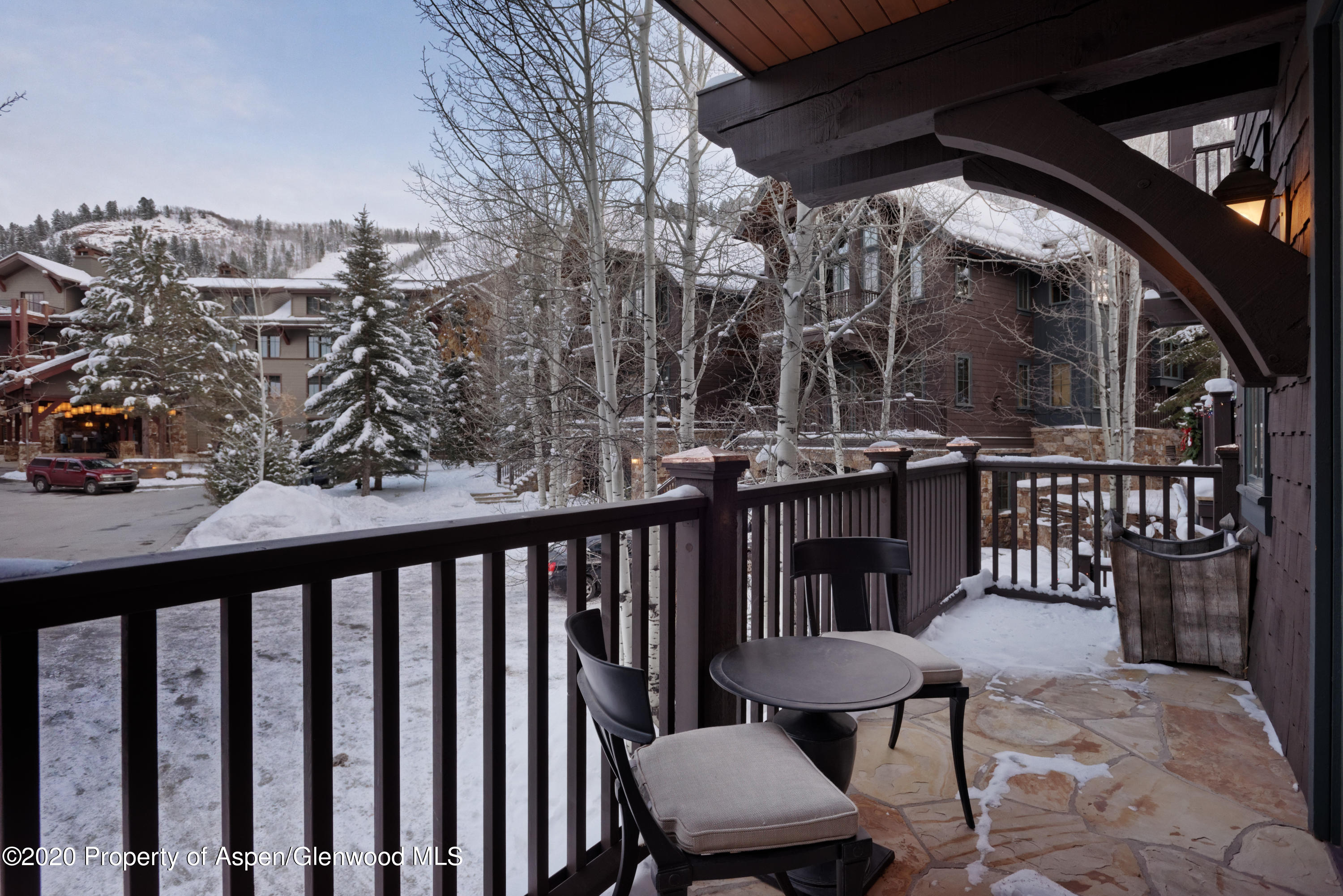 32 Prospector Road Aspen, CO 81611 - Photo 24 of 37 a view of a chairs and table in the patio