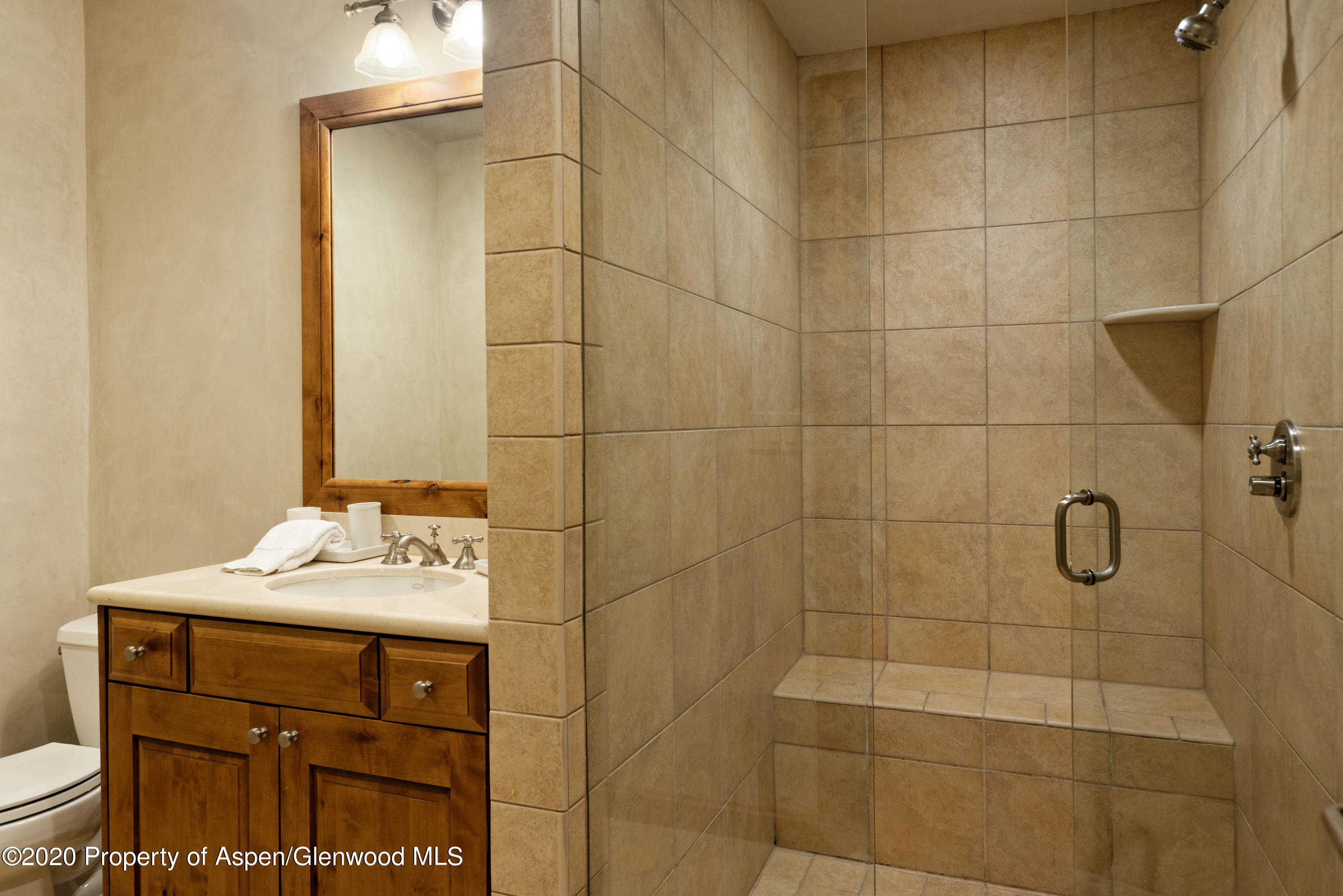 32 Prospector Road Aspen, CO 81611 - Photo 30 of 37 a bathroom with a sink toilet and shower