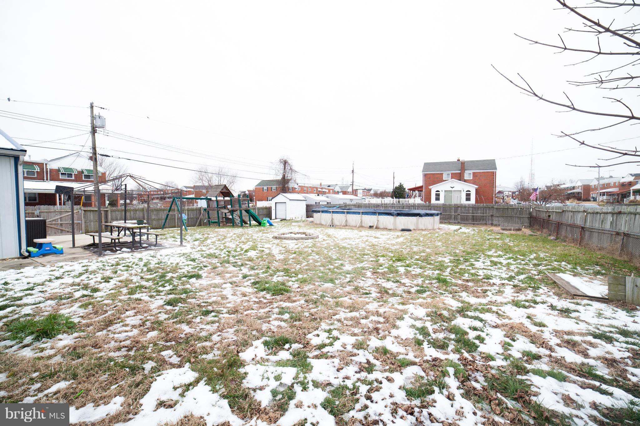 7859 Kentley Road Baltimore, MD 21222 - Photo 30 of 36 Fenced Yard with above ground pool
