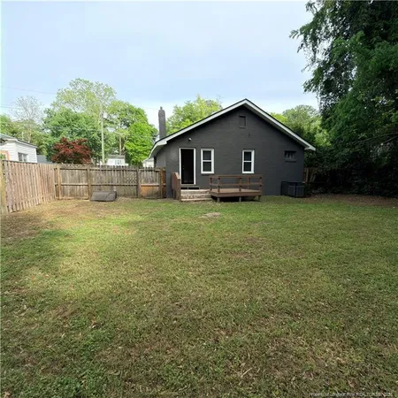 a house view with a garden space