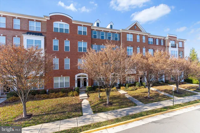 a front view of a building with street view