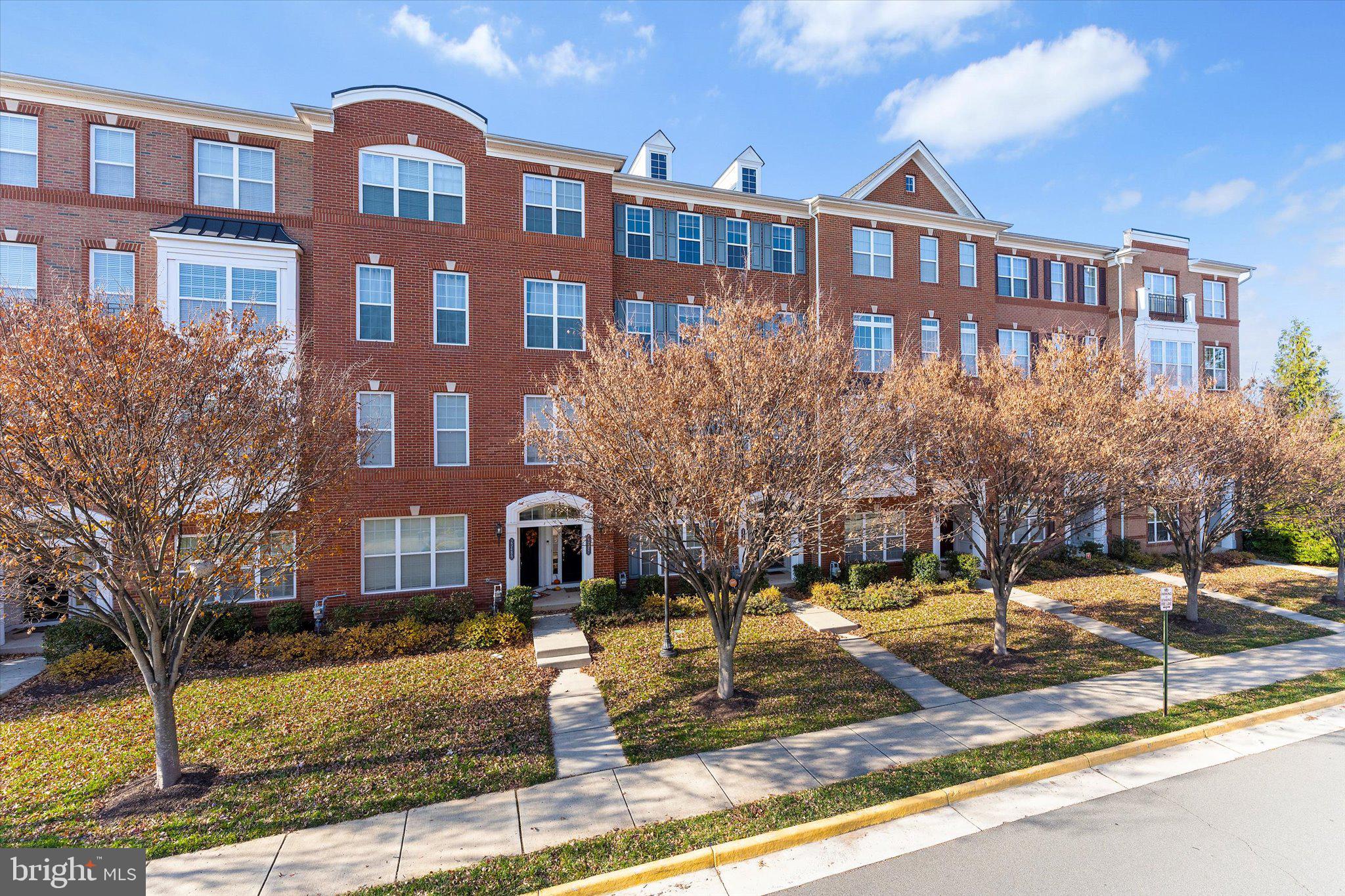 23483 Logans Ridge Terrace Ashburn, VA 20148 - Photo 1 of 35 a front view of a building with street view