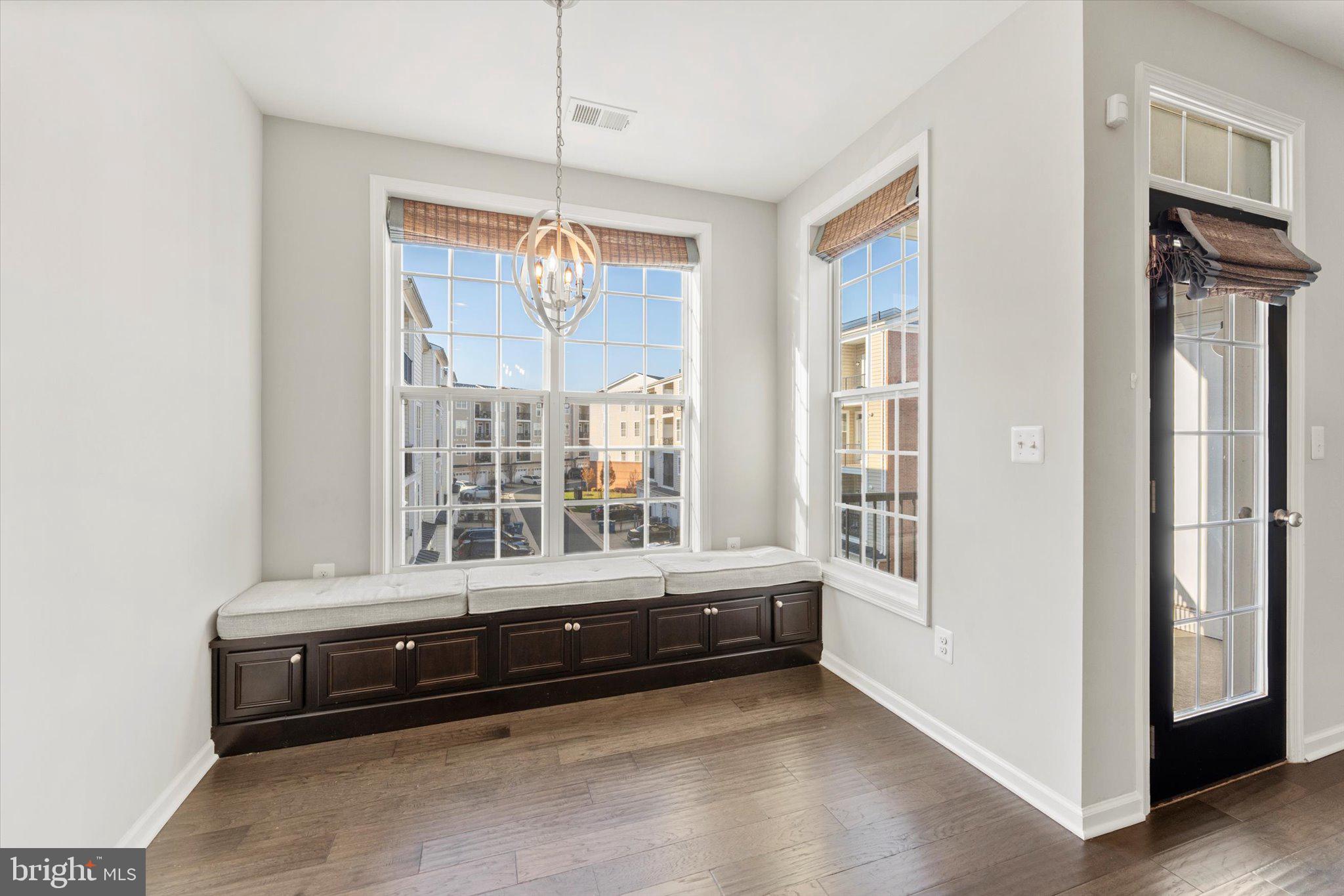 23483 Logans Ridge Terrace Ashburn, VA 20148 - Photo 13 of 35 a bathroom with a tub that has a large window