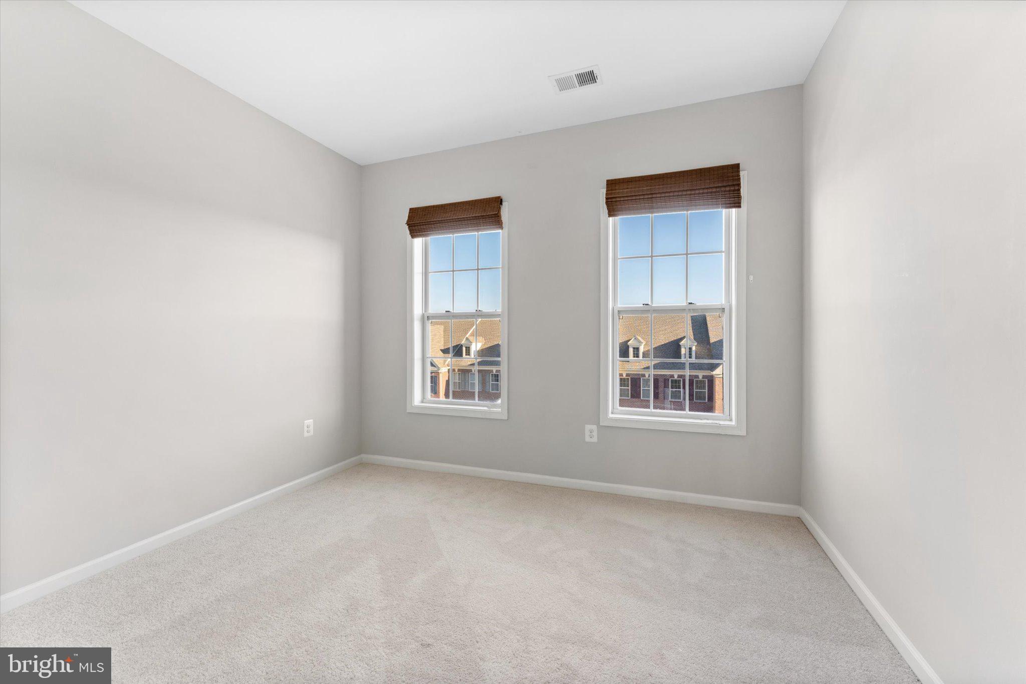 23483 Logans Ridge Terrace Ashburn, VA 20148 - Photo 29 of 35 an empty room with a window