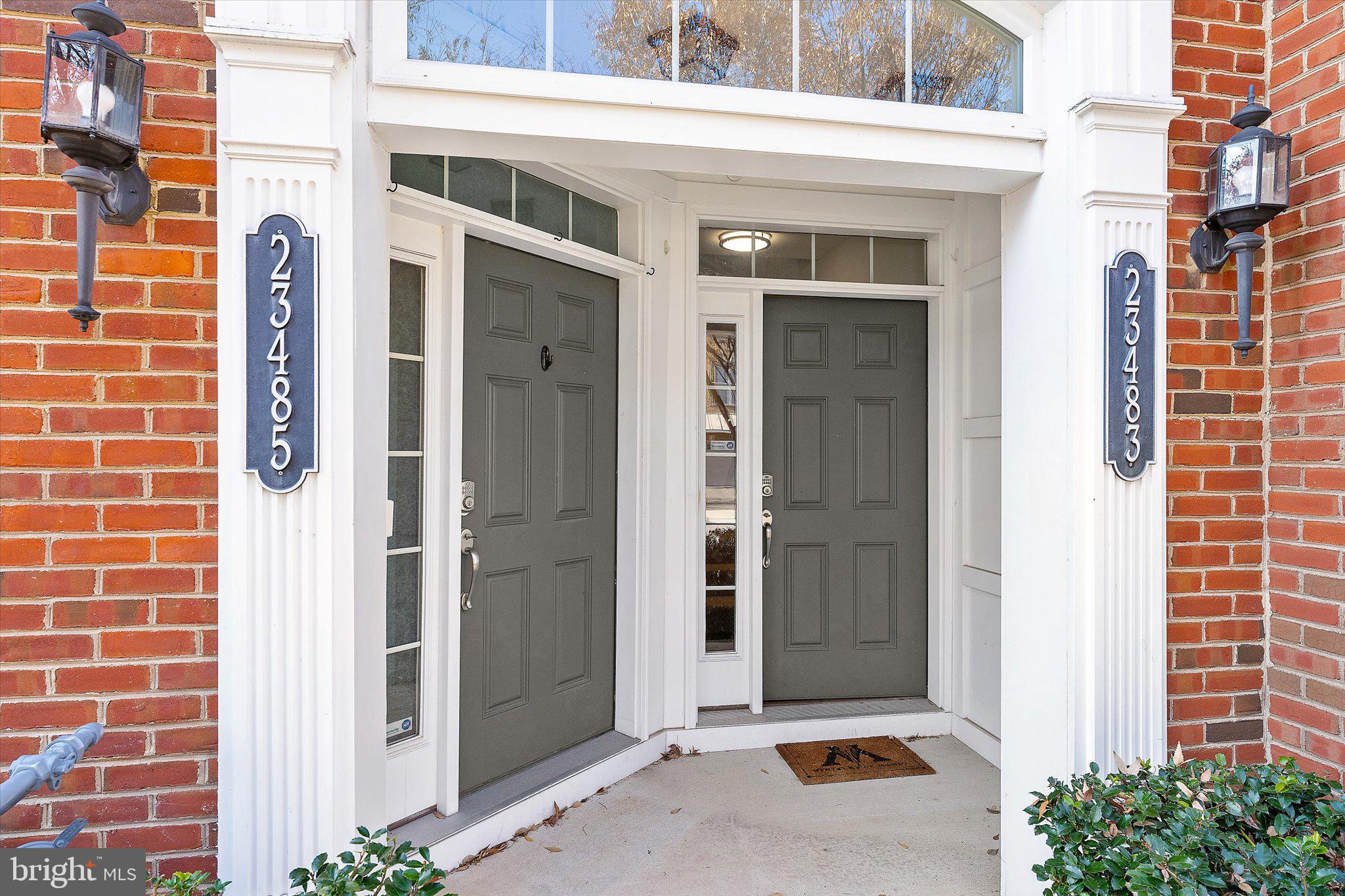 23483 Logans Ridge Terrace Ashburn, VA 20148 - Photo 3 of 35 a house view with a outdoor space