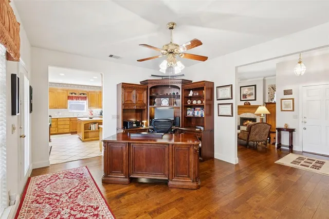 a very nice looking living room with a large window