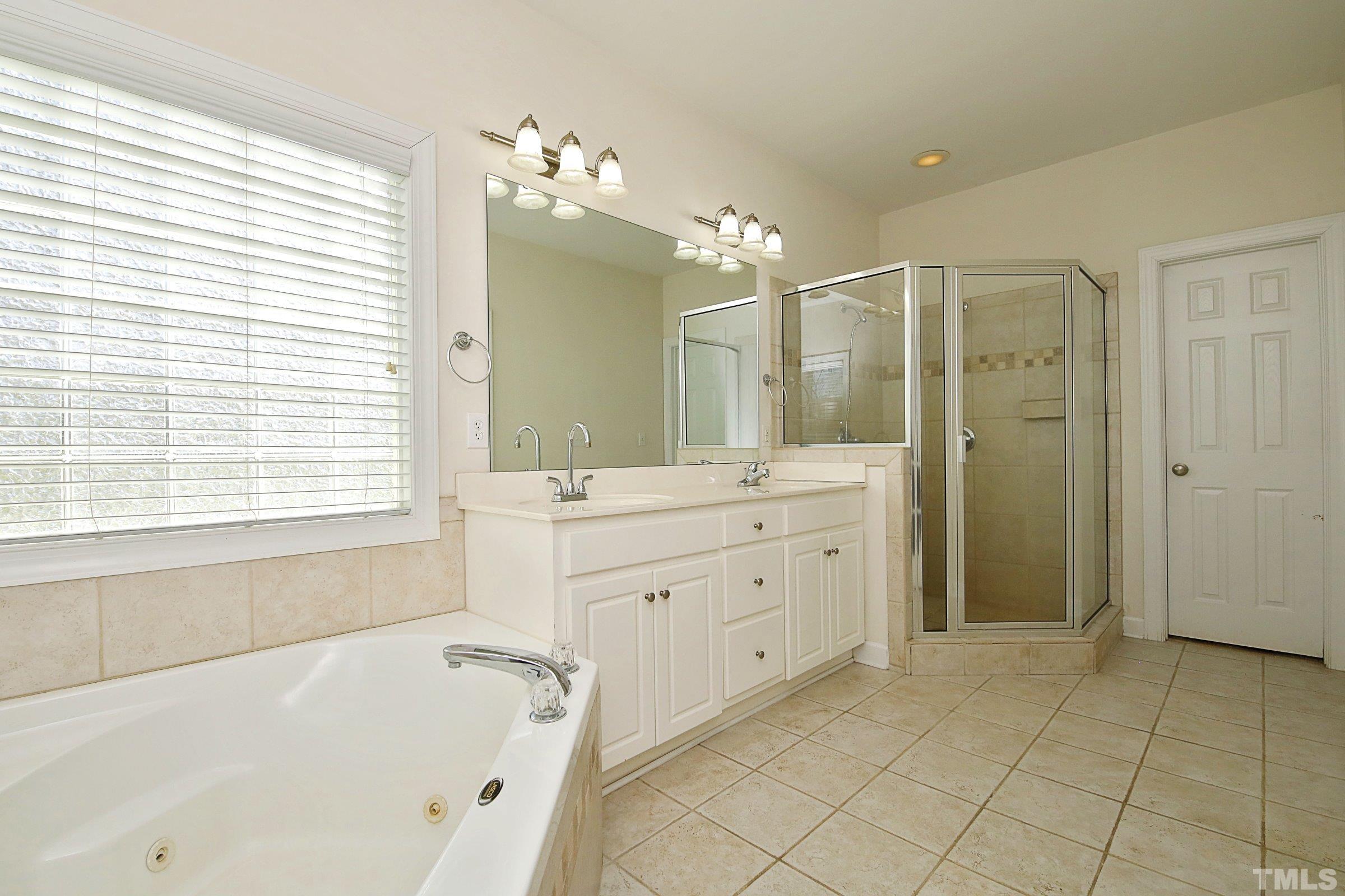 1221 Jogging Court Raleigh, NC 27603 - Photo 19 of 35 You Want Space! This is a Great Walk-In-Closet - Built In Shelving...You Will Love It