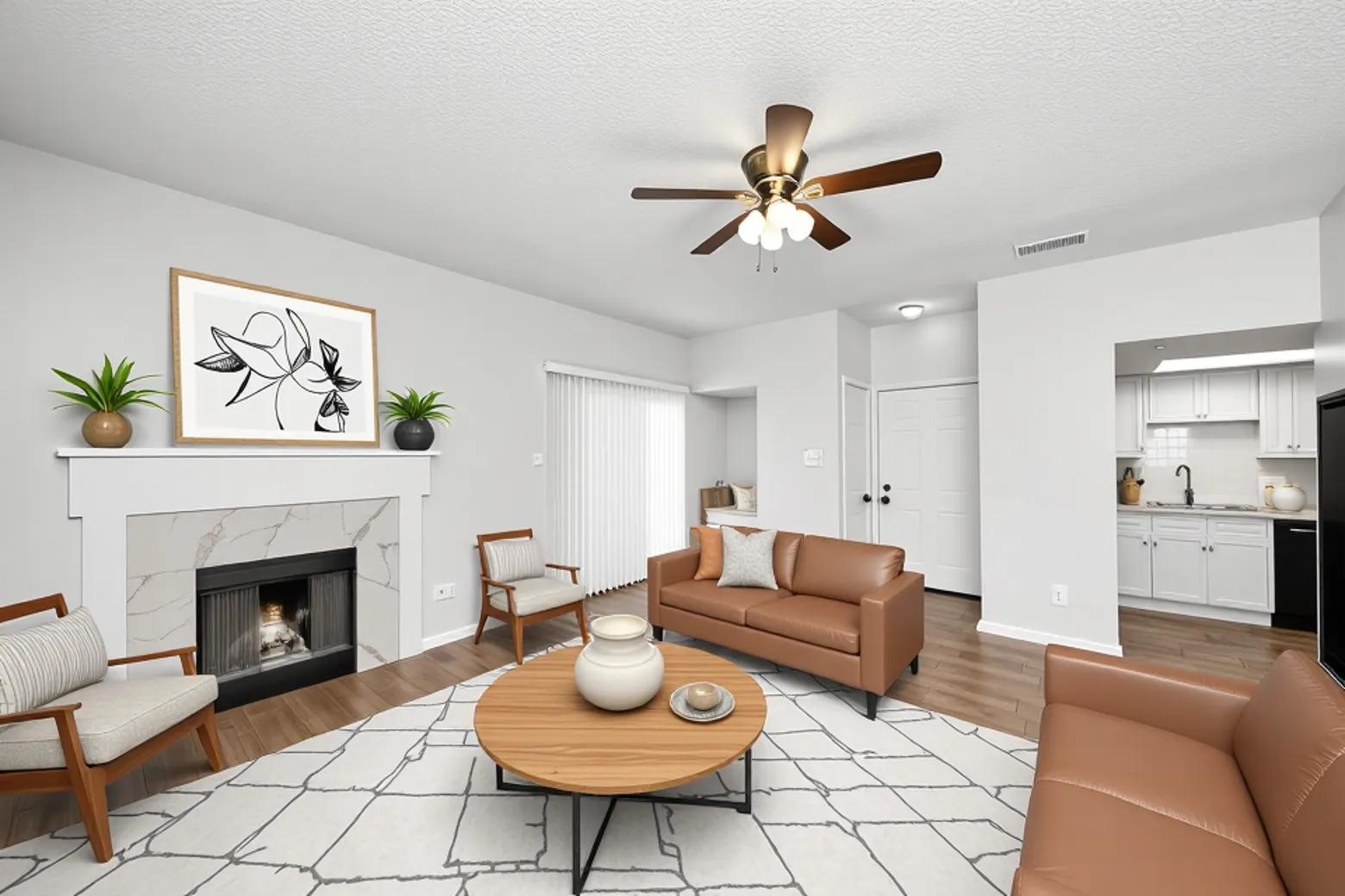3750 Tanglewilde Street, Unit A7 Houston, TX 77063 - Photo 1 of 41 a living room with furniture a rug and a fireplace