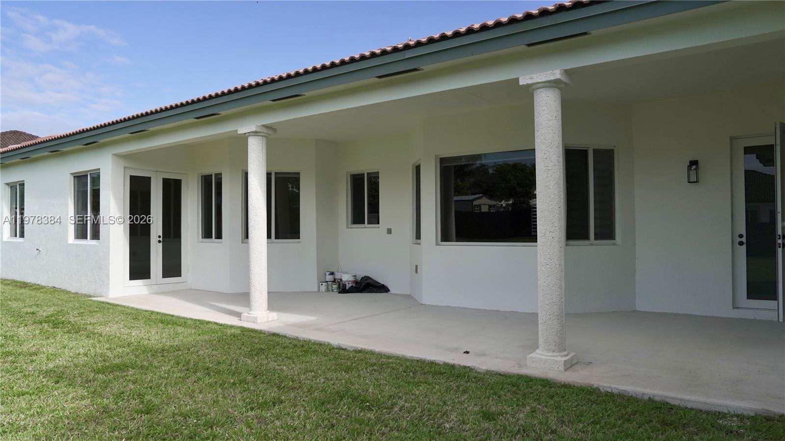 13162 Southwest 191st Terrace, Unit 1 Miami, FL 33177 - Photo 3 of 7 a view of house with backyard