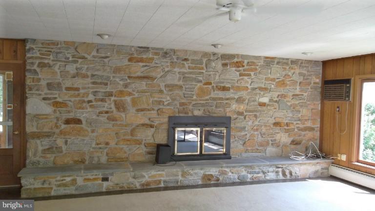 6301 Rt 32 Es Guilford Road Clarksville, MD 21029 - Photo 3 of 28 a view of a fireplace