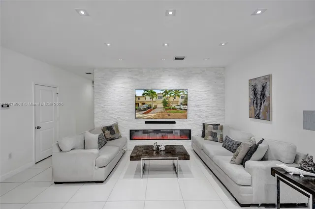 a living room with furniture and a couch