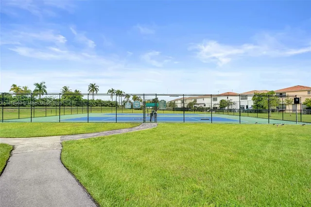 a view of a golf course with a garden