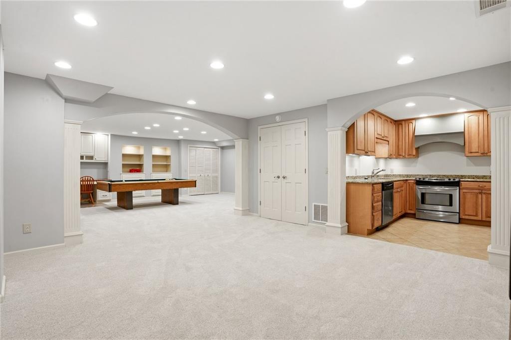 210 Woodrill Way Atlanta, GA 30350 - Photo 29 of 34 a view of a kitchen with a sink and a large window
