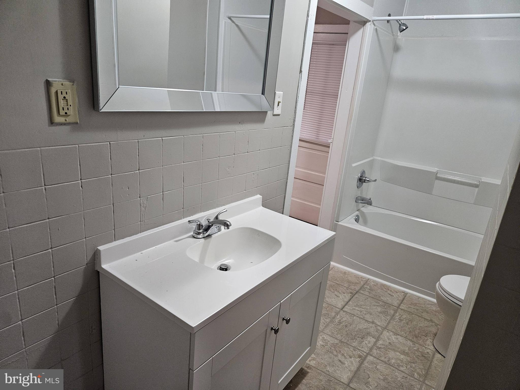 10 East Frederick Street, Unit 10B Walkersville, MD 21793 - Photo 15 of 18 Full bathroom with new vanity