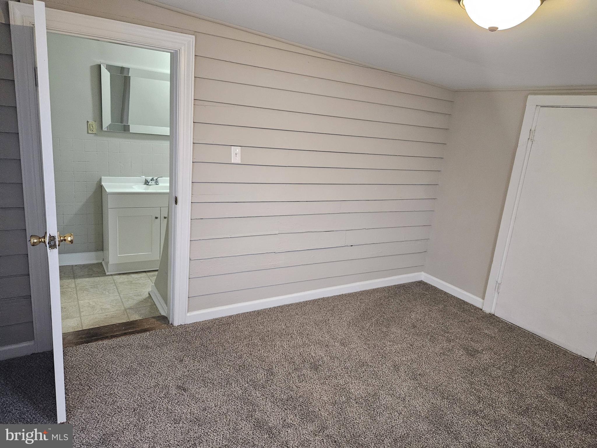 10 East Frederick Street, Unit 10B Walkersville, MD 21793 - Photo 6 of 18 Bedroom with new carpet and fresh paint