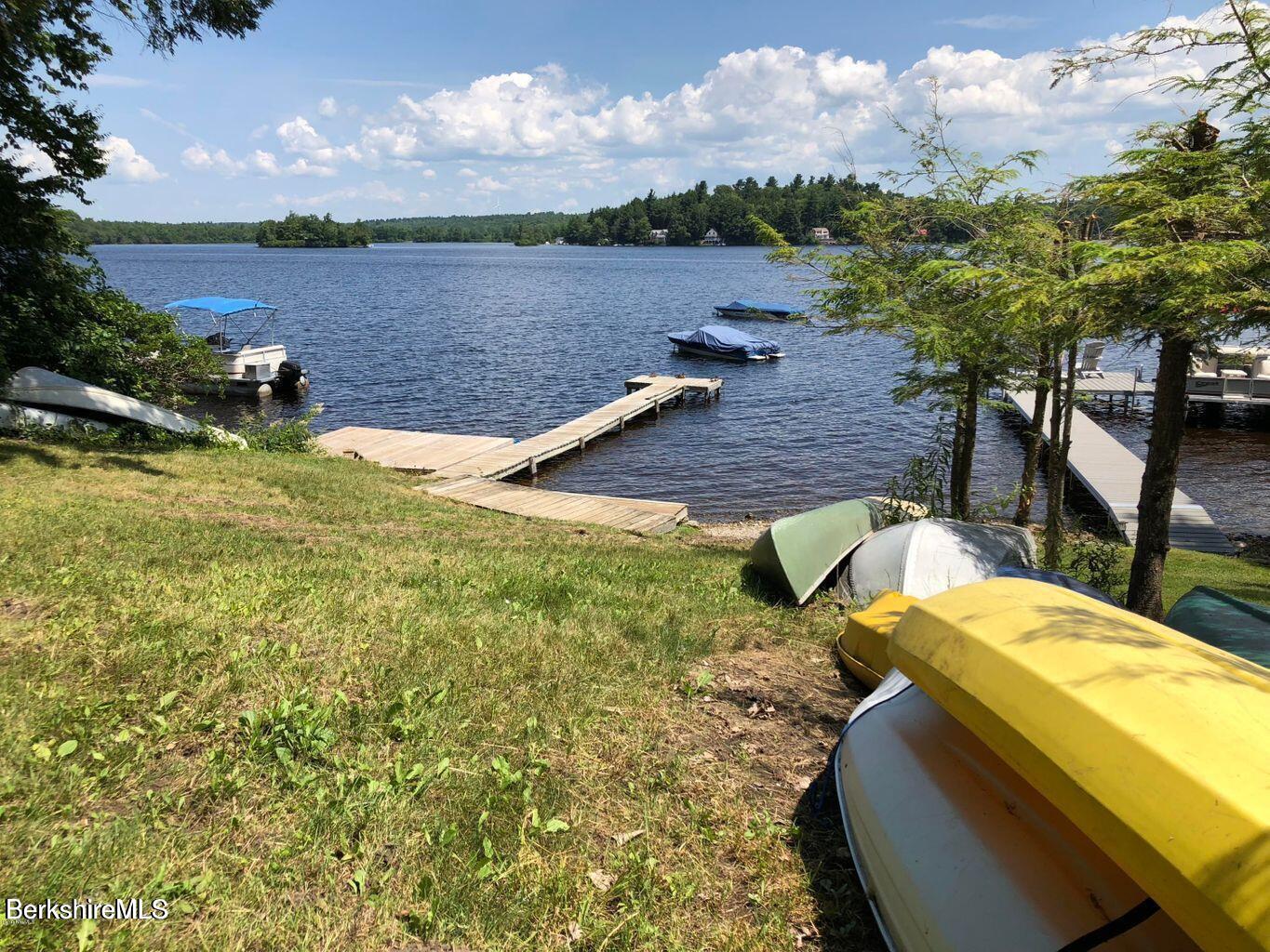 58 Stanley Road East Otis, MA 01029 - Photo 12 of 14 a view of a lake with a yard