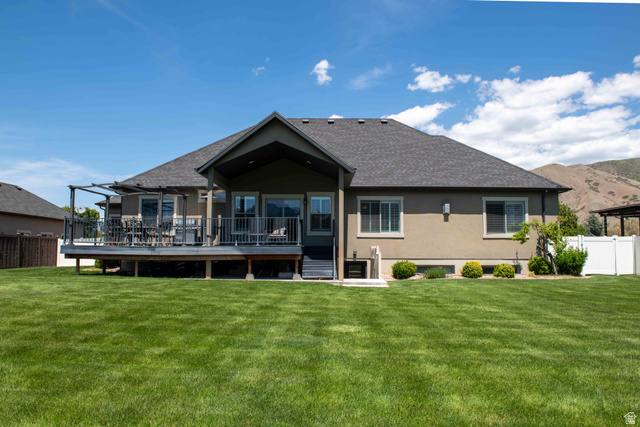 646 East 1400th Street North Mapleton, UT 84664 - Photo 65 of 78 Expansive rear yard featuring a large composite deck, covered patio, and pergola structure