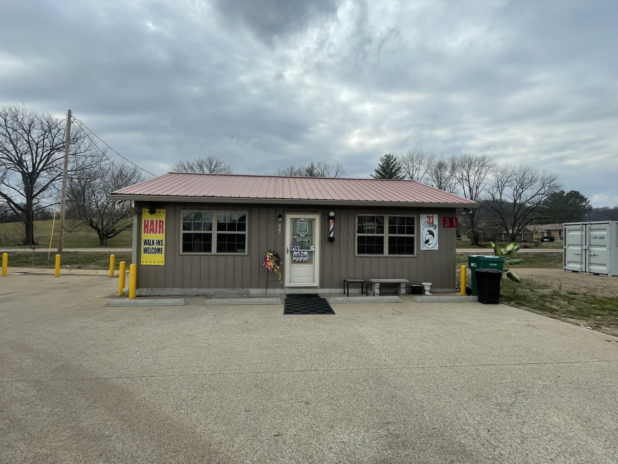 7549 Elkton Pike Prospect, TN 38477 - Photo 23 of 24 a view of a house with a large window and a yard