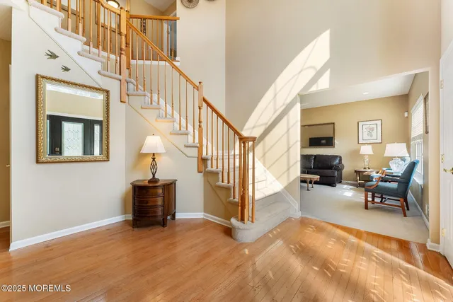 a view of livingroom with furniture and workspace