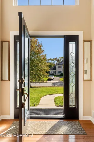 a view of a porch with a floor to ceiling window