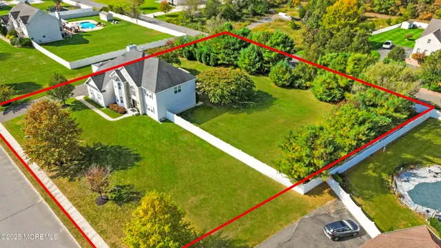 a view of a backyard with plants