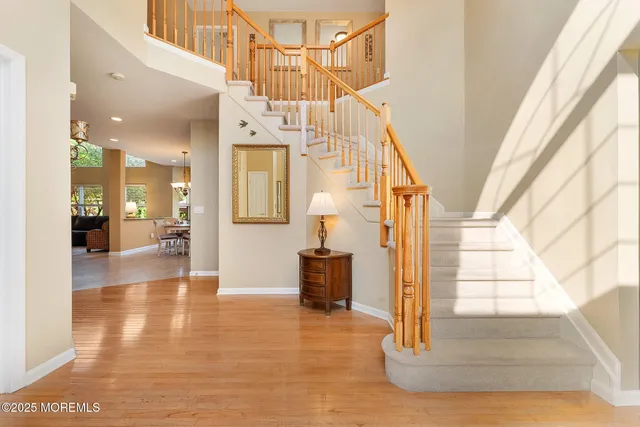 a view of a hallway view with staircase