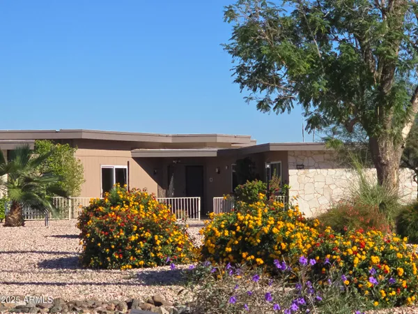 front view of a house with a small yard
