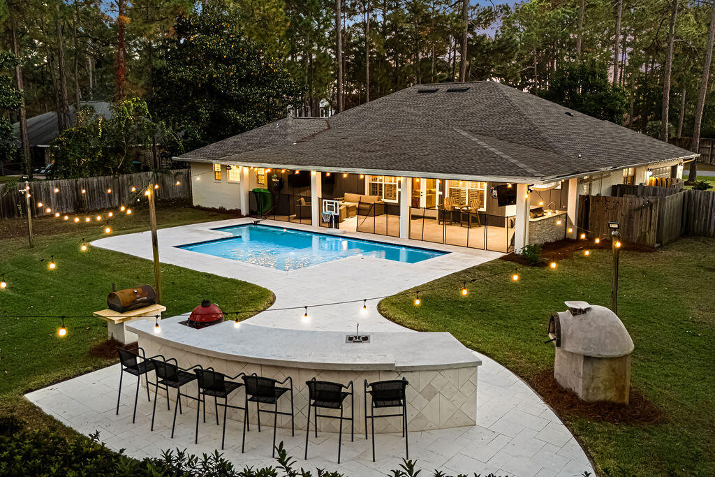 an outdoor space with furniture and umbrella