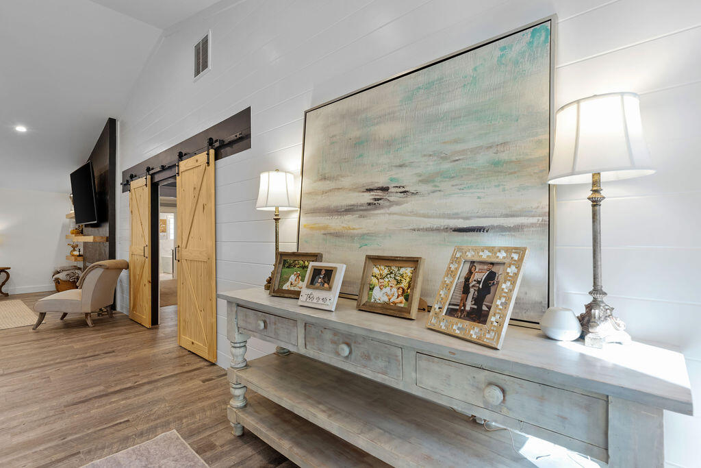 442 Shipwreck Road Santa Rosa Beach, FL 32459 - Photo 24 of 103 a bathroom with a sink a mirror and a shower